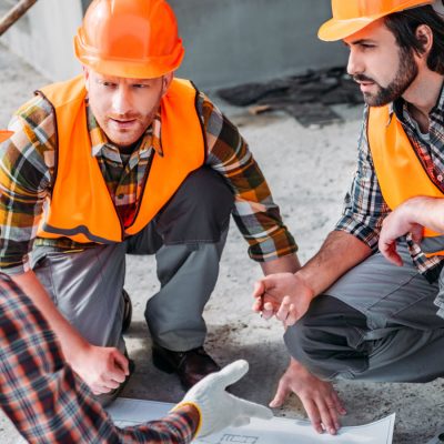 close-up-shot-of-group-of-confident-builders-havin-2021-09-03-05-43-37-utc-1.jpg